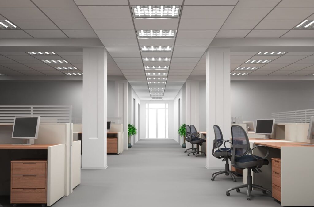 Benefits of cleaning services in Steele Creek, NC by Queen City Cleaners, professional cleaners using eco-friendly products in a commercial office.